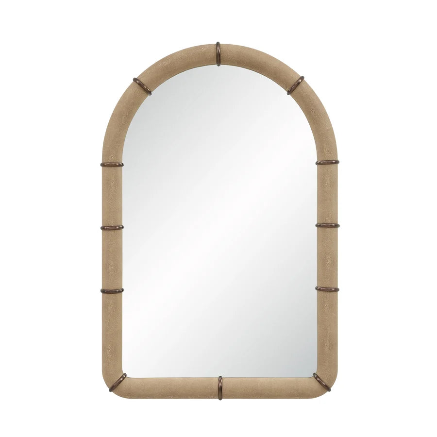 Front view of the Mirelle Wall Mirror with an arched silhouette, beige shagreen-textured vegan leather frame and antique metal accents.