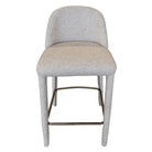 Full front view of the Myla counter stool featuring a curved, hugging backrest and plush textured beige upholstery.