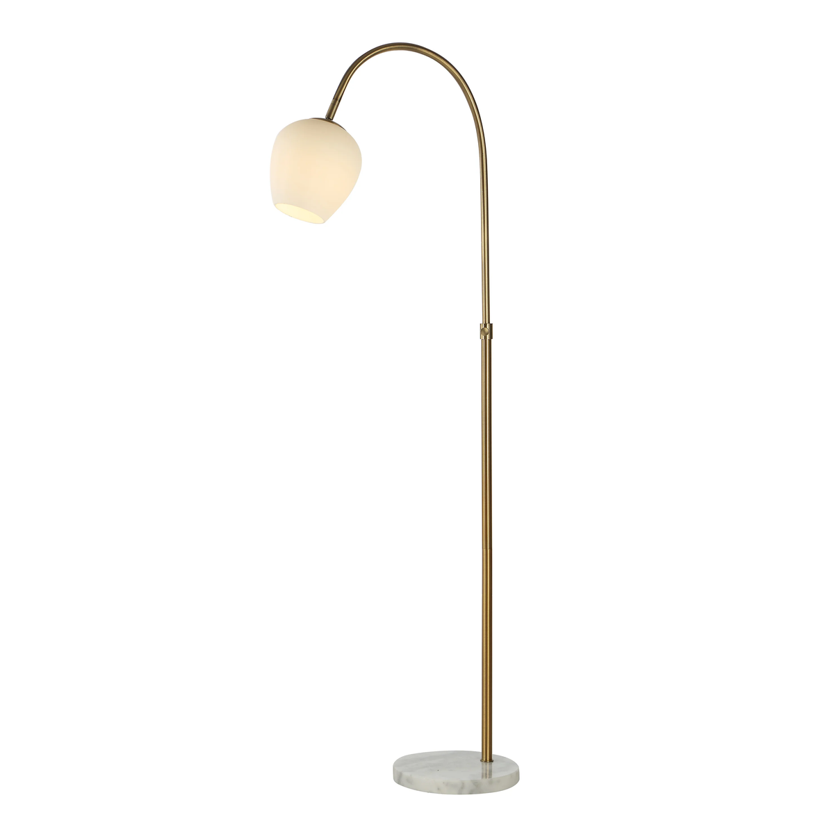 Noemi floor lamp illuminated to show the warm glow through its opal glass shade.