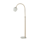 Noemi floor lamp shown in full with its antique brass arc frame and white marble base.