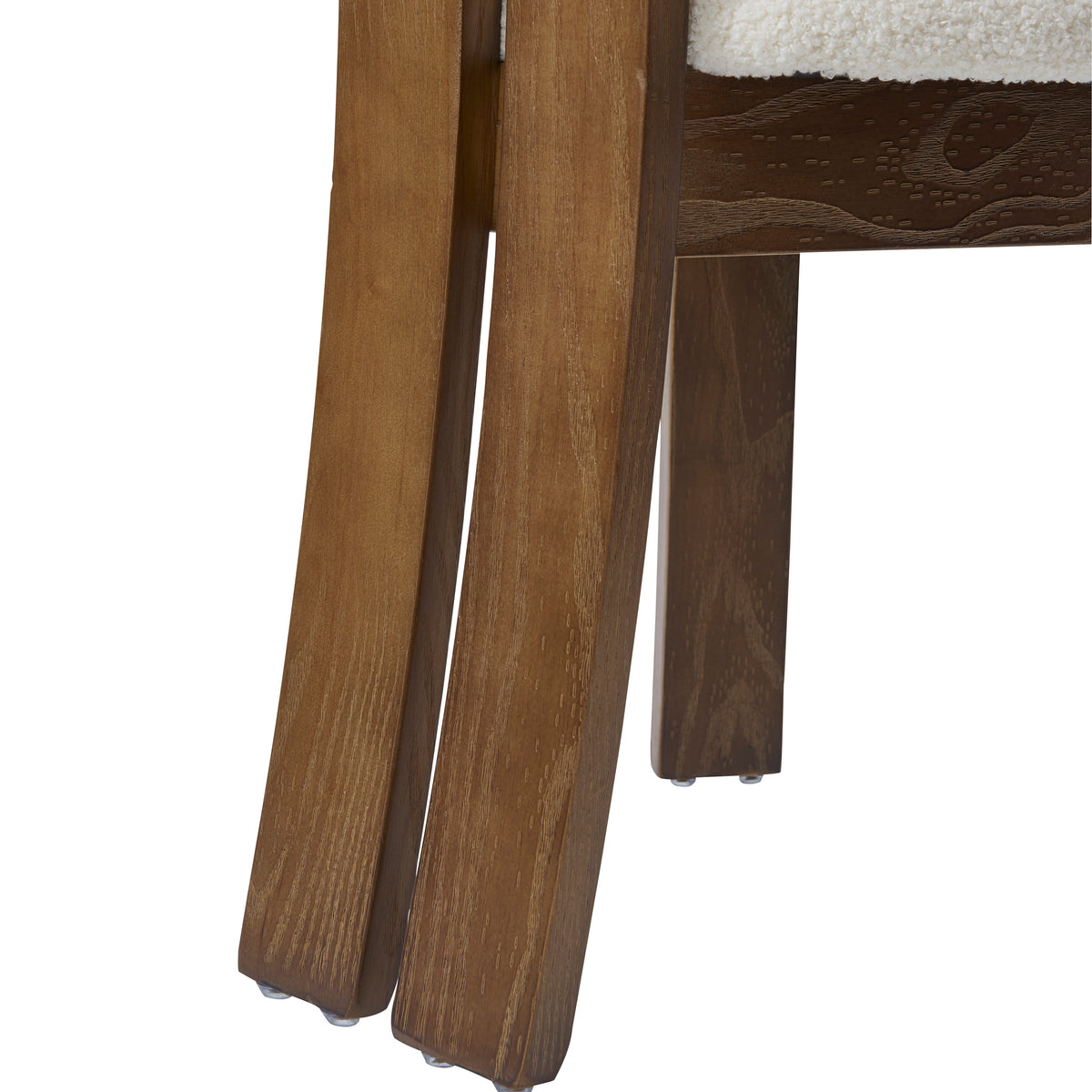 Close-up details of the wooden base of the Obsidian Loop Dining Chair