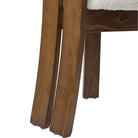 Close up details of the wooden base of the Obsidian Loop Dining Chair