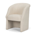 Angled view of the Octavia cream upholstered dining armchair