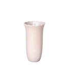 White ribbed vase on a light gray background