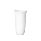 White ribbed vase on a light gray background