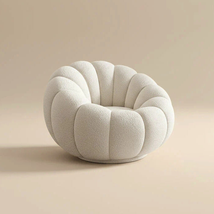 Round, cushioned chair with a textured surface on a beige background