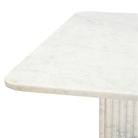 Corner view of the Ophelia Marble Coffee Table on a white background