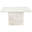 Front view of the Ophelia marble table with a marble top and fluted base on a white background