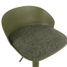 Close-up of the olive green Orla stool showcasing the speckled green woven fabric of the comfortable seat cushion.