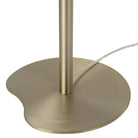 Close-up of Pearl Glow Floor Lamp base in brushed brass with sculptural, rounded shape.