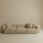 Beige sectional sofa against a beige wall