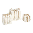 Set of three white plush decorative gift boxes with brown-and-white striped bows