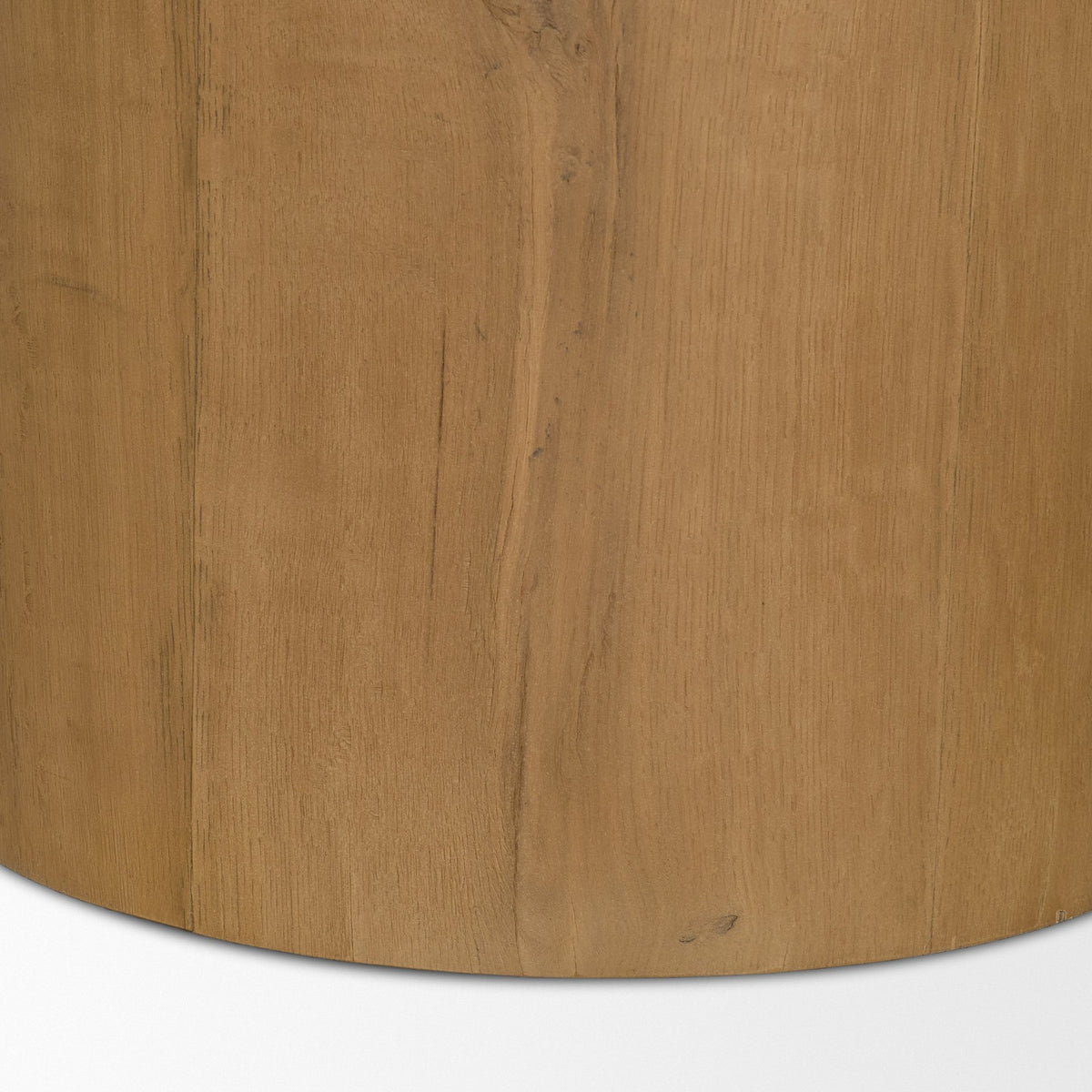 Close-up of the natural grain and warm brown finish on the Romina solid oak pedestal