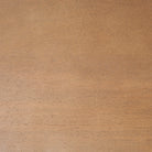 Close-up of the warm medium brown finish and natural wood grain on the Rowan arched bookcase.