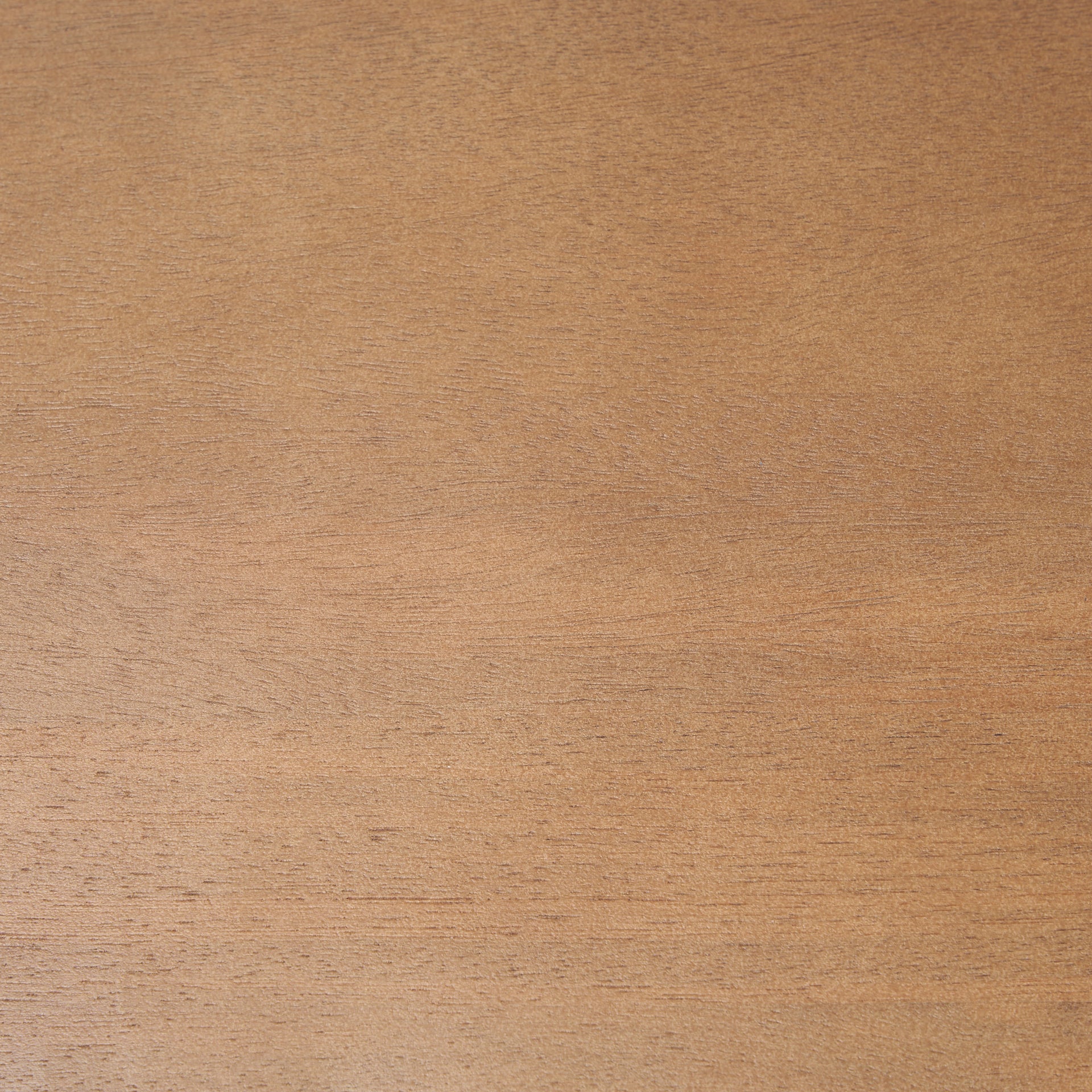 Close-up of the warm medium brown finish and natural wood grain on the Rowan arched bookcase.
