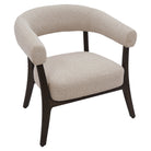 Three-quarter studio view of the Rowan chair highlighting the unique wrap-around backrest and sculpted wooden legs.