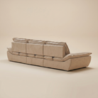 Rear studio view of the sailing-shaped sofa showcasing the modular base and adjustable backrest supports.