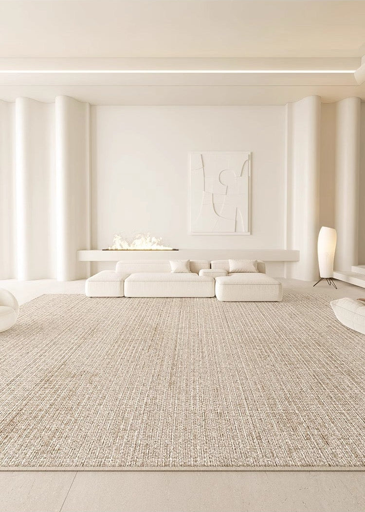 Sandy Oasis Rug styled in a minimal beige living room with low modular sofa and soft ambient lighting