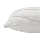 Close-up of the crisp corner seam and thick textured fabric on the white Seraphina knitted chevron throw pillow.
