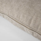 Close-up of the linen Serenity pillow showing the high-quality woven fabric and discreet invisible zipper closure.