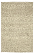 Full overhead view of the rectangular Silas hand-woven wool rug featuring a solid textured cream ivory surface.