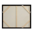 Back view of Silent Flight canvas showing sturdy wooden stretcher bars and pre-installed D-ring hanging hardware.