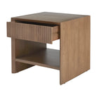 Angled view of the Silva mango wood nightstand with the fluted drawer partially open to show internal storage space.