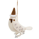 A white felt owl hanging ornament wearing a brown felt Santa hat with a white fluffy trim, suspended by a brown string against a plain white background.