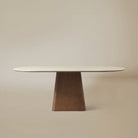 Front view of the oval Sorella Dining Table in natural travertine