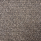 Close-up of the charcoal upholstery texture on the Soren Bouclé Dining Chair