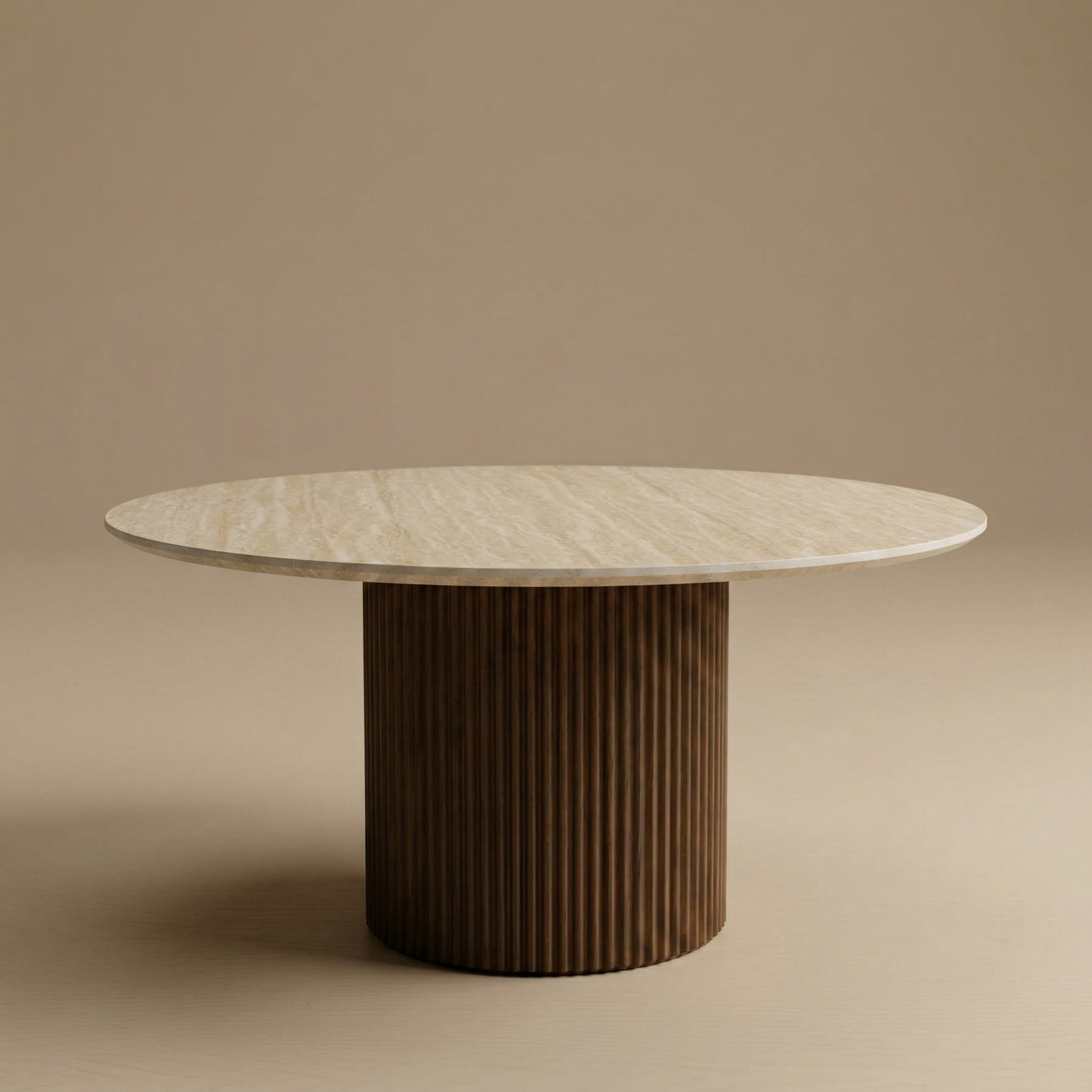 Round dining table with a marble top and ribbed brown base on a beige background