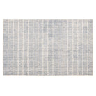 Full view of the Tessera Hand-Tufted Wool Grid Rug in blue with an ivory linear grid pattern.