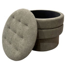 Moss color chenille fabric ottoman with tufted design on a white background