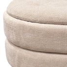 Close-up of a beige textured ottoman