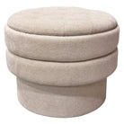 Beige fabric ottoman on a white background