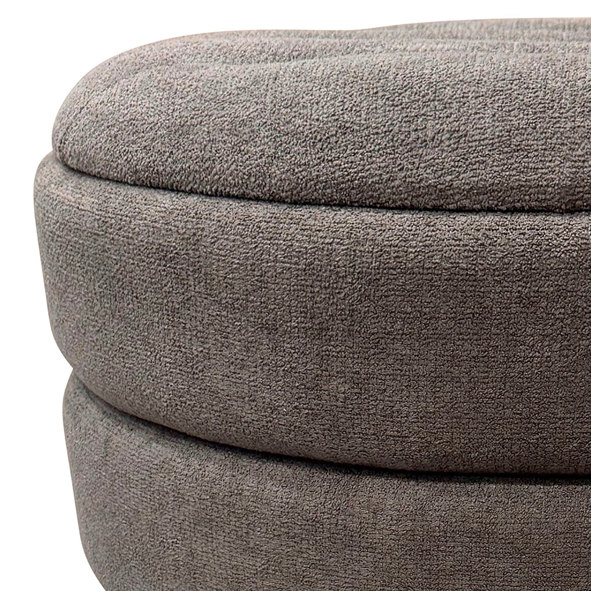 Close-up of a textured gray ottoman on a white background