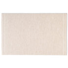 Full top-down view of the Theo hand-woven wool rug in ivory cream, featuring a chunky honeycomb basketweave texture and banded edges
