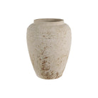 Textured beige vase on a white background