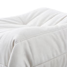 Close-up of the togo ottoman on a white background