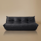 Front view of the TOGO Three Seater Lounger in light beige studio background