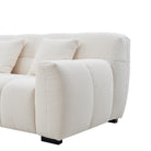 Close-up of a textured boucle Gummy  Sofa on a white background
