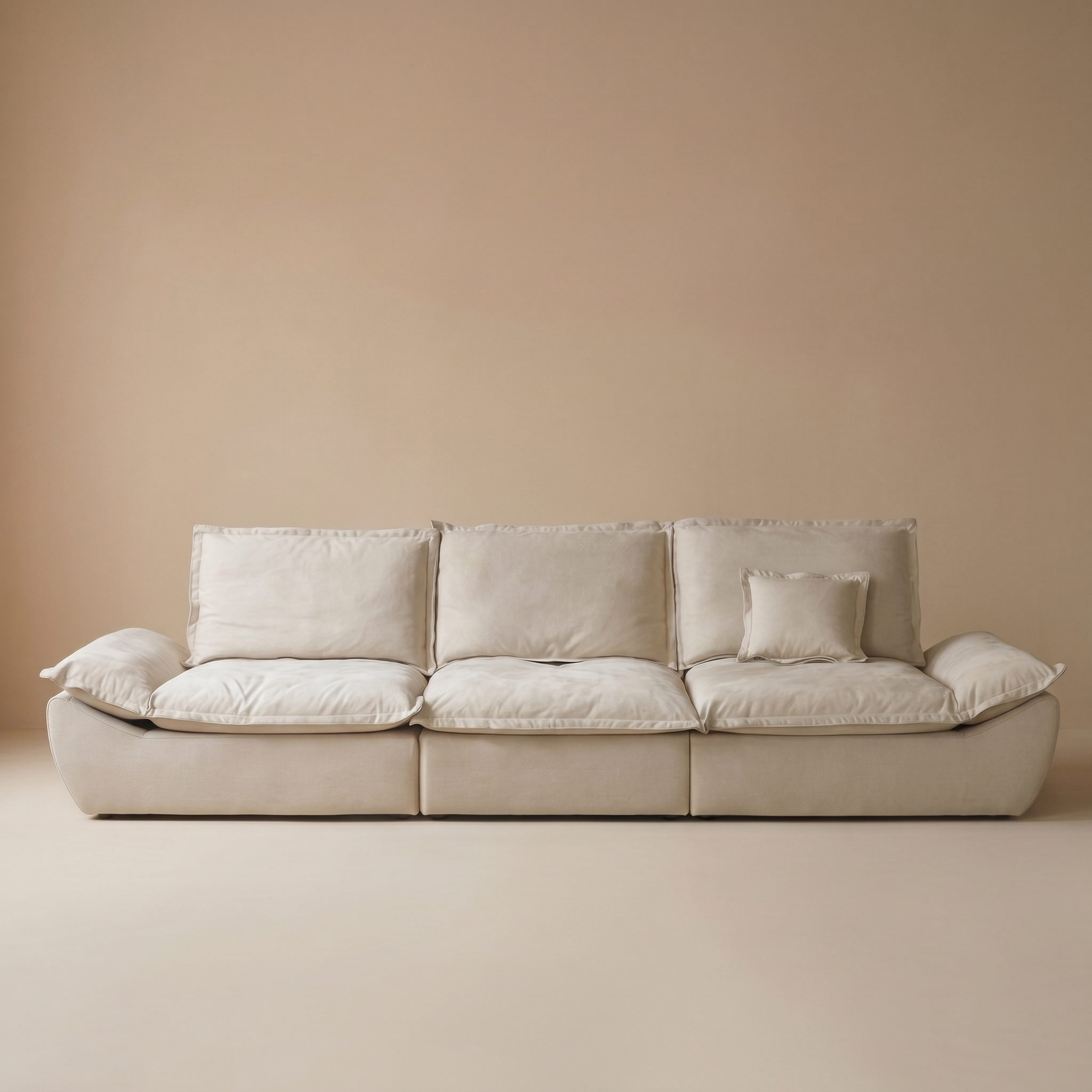 Full front view of the beige sailing-shaped modular sofa against a neutral background.