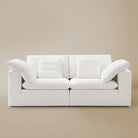 Front view of the Ultra Softness Cloud Sofa two-seater variant in natural linen on a clean studio background.