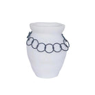 White vase with a black chain-like decorative element on a white background