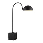Black table lamp with curved arm on a white background