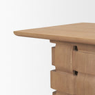 Close-up of the Varelle Side Table pedestal base showing the interlocking carved mango wood woven texture.