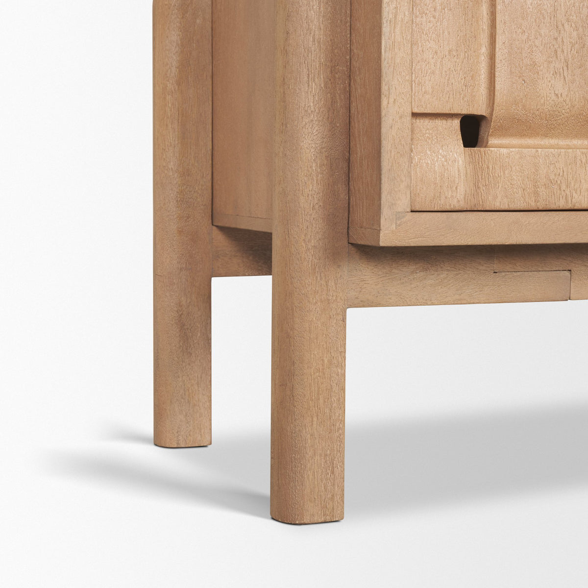 Close-up of the Varelle Sideboard solid mango wood legs and lower frame construction.