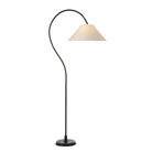 Vienne arc floor lamp illuminated to show the warm glow through its oatmeal linen shade.