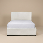 Full front view of the Vivienne upholstered platform bed in cream fabric featuring a modern low-profile design.