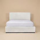 Full front view of the Vivienne upholstered platform bed in cream fabric featuring a modern low-profile design.